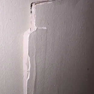 Hole in the bathroom wall.