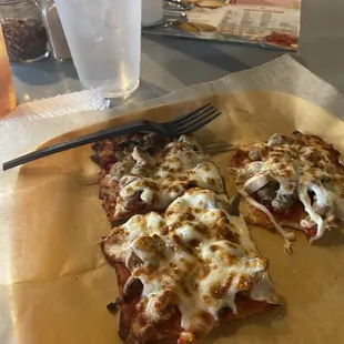 Personal size cheese pizza order with mushrooms and Italian sausage