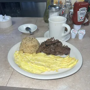 Tapa with garlic fried rice and eggs