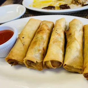 Fried vegetables lumpia served with sweet chili sauce