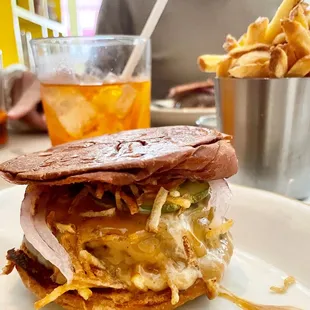 a plate with a sandwich and french fries