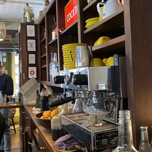 a view of a coffee shop with people in the background