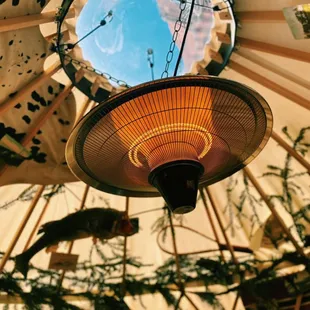 the inside of a tent with a heater