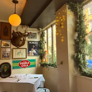 a dining room with a table and chairs