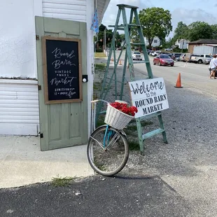 a bicycle parked in front of a store