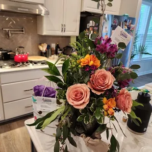 Birthday flowers and a stuffed surprise on the side!