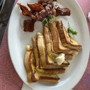 Full stack of French toast Side of bacon