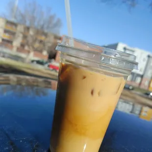 a cold beverage in a plastic cup