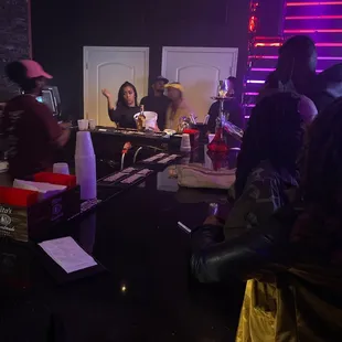 The manager is the one in the hat