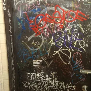 The entrance to the mens restroom