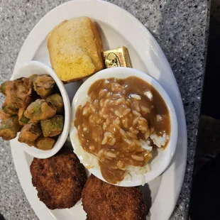 Salmon cakes, ocra, and rice with gravy