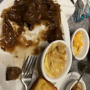 Boxed mashed potatoes and gravy, Mac n cheese, that tasted two days old, cornbread, pot roast covered in brown gravy.