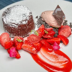 a chocolate cake and strawberries