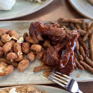 Appetizer " Trio" ( duck with sweet tangy sauce; garlic cheese curds; fried green beans)