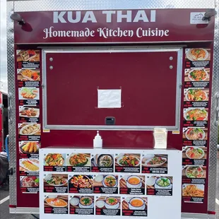 a food truck with menus