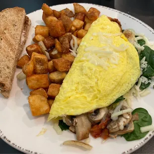 Veggie omelette with country potatoes and toast