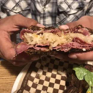 The Reuben yes my sons hands he can barely hold it up for me to take this picture he was shoving it in his mouth so quickly