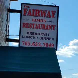 a sign for the fairway family restaurant