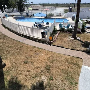 The pool that is not as big as the website pictures with even more construction right outside the gate.