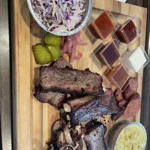 a variety of meats on a cutting board