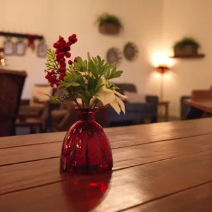 a vase of flowers on a table