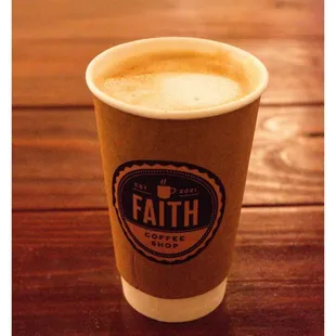 a cup of coffee on a table