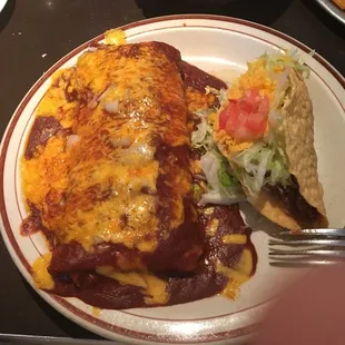 Bean burrito enchilada style with beef taco.