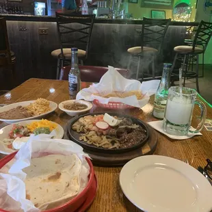 My go to order, chicken &amp; beef fajitas with a frozen house margarita.