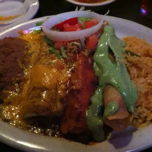 Platos Mexicanos w/fajita beef enchilada, pork tamale, chicken flauta, rice and beans