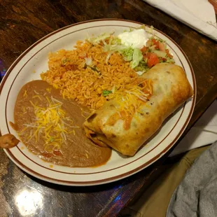 Veggie chimichanga with refried beans, rice, sour cream, pico de gallo
