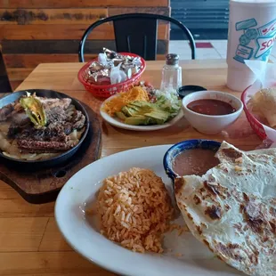 Beef/Chicken fajitas, Rice, Beans, Flour tortillas, Salsa/Chips