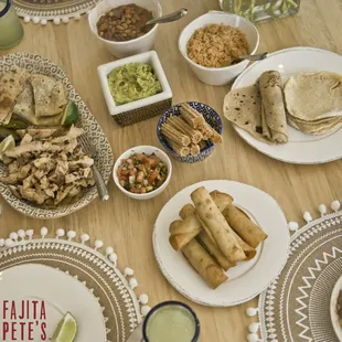 a table full of mexican food