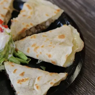 a plate of quesadillas
