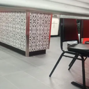 a view of the counter and chairs