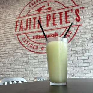 Frozen Margarita.  Two straw share.