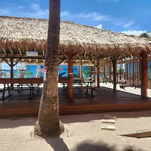 Picnic tables facing our stage for live music nights