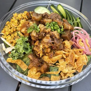 salad with pork belly on top