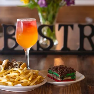 Philly cheesesteak, Moscato Sunrise and Rainbow Cookie