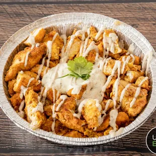 a bowl of fried falafel