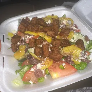 Greek salad with gyro "nuggets"