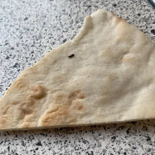 a piece of flat bread on a counter