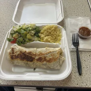 Falafel Wrap plate. Includes the wrap, rice and salad.