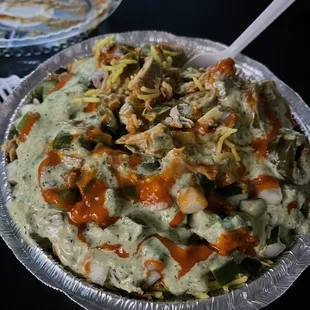 Chicken bowl with rice, cucumbers, onions, jalapeños, and green bell peppers with zuzi and chilli sauce!!!