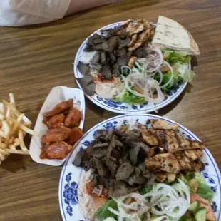 Combo platter chicken n lamb platter. Comes with humus,  salad,  n pita  Soooo good