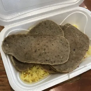 a meal in a styrofoam container
