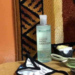 Hand sanitizer at every table