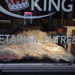 View through window facing Otis Street.  That&apos;s a lot of flat bread; it goes all the way back to the drink case.