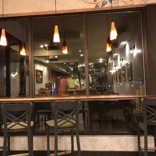 a view of a restaurant through the window