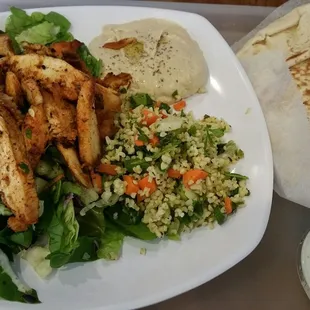 Marinated Chicken Plate with Hummus and Tabouli.