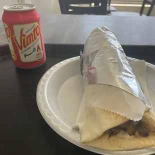 Nicely wrapped lamb roll up, w drink. Delicious.